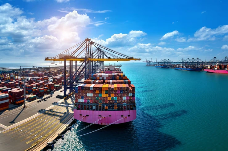 cargo ship at port with cranes