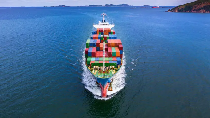 container ship sailing in open waters