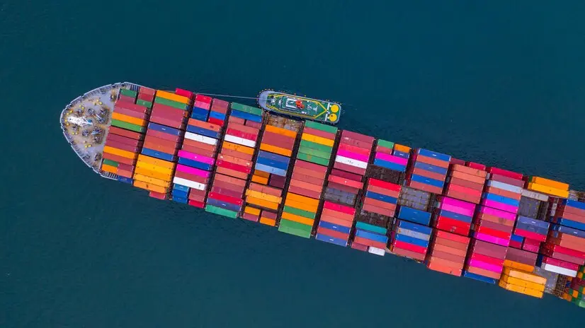 top view of cargo ship with containers